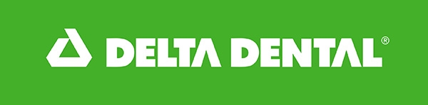 Delta Dental logo with white lettering on a bright green background