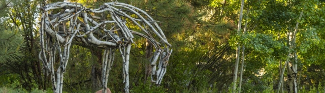Minimalist horse sculpture using branch and stick pieces