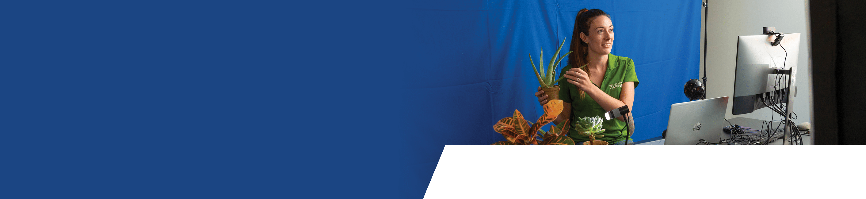 Katelin Gaeth, Assistant Manager of School & Camp Programs, using the Denver Botanic Gardens remote learning technology to interact with a family in their home 