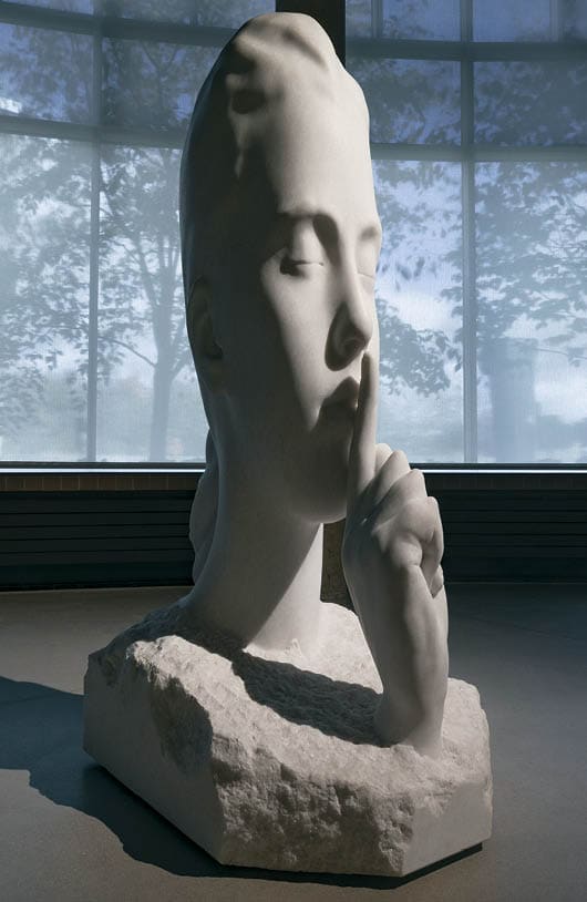 A white sculpture of a man with his hand on his chin, sitting on a rock. AI generated content