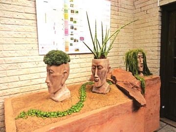 Succulent sculptures at entrance to cactus and succulent greenhouse, Gothenburg botanic garden