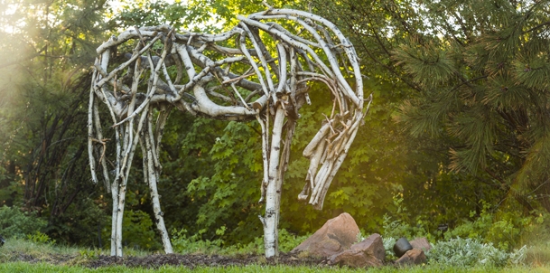 Minimalist horse sculpture using branch and stick pieces
