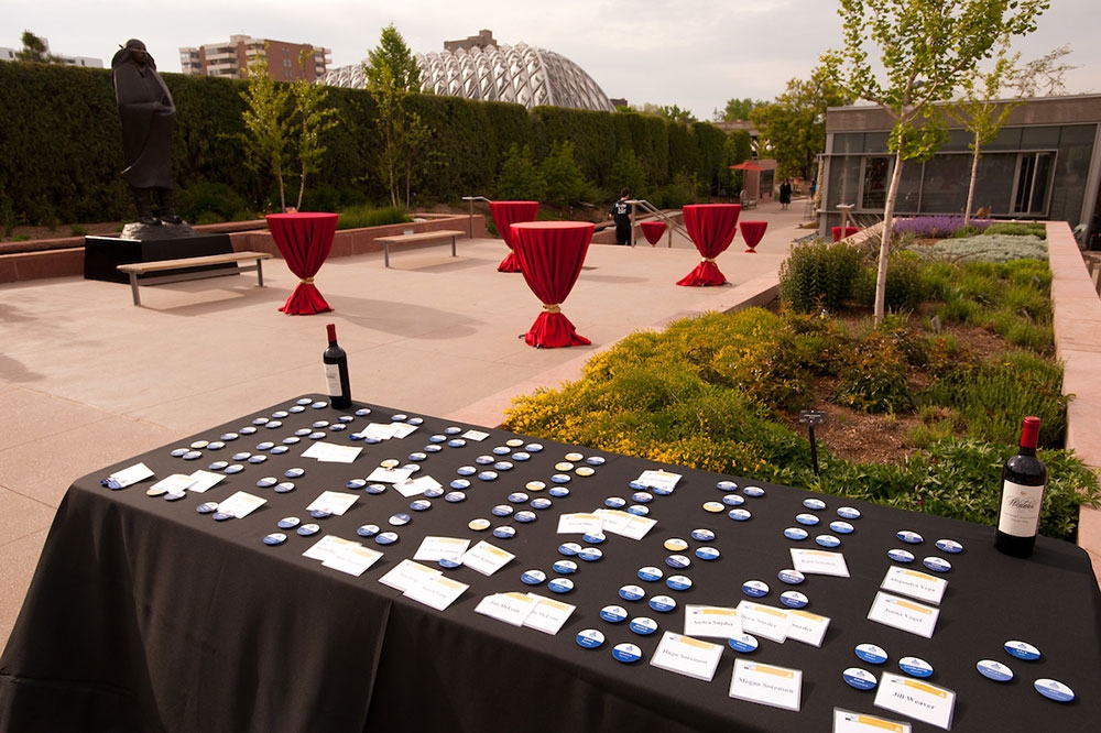 A check in table in the welcome gardens