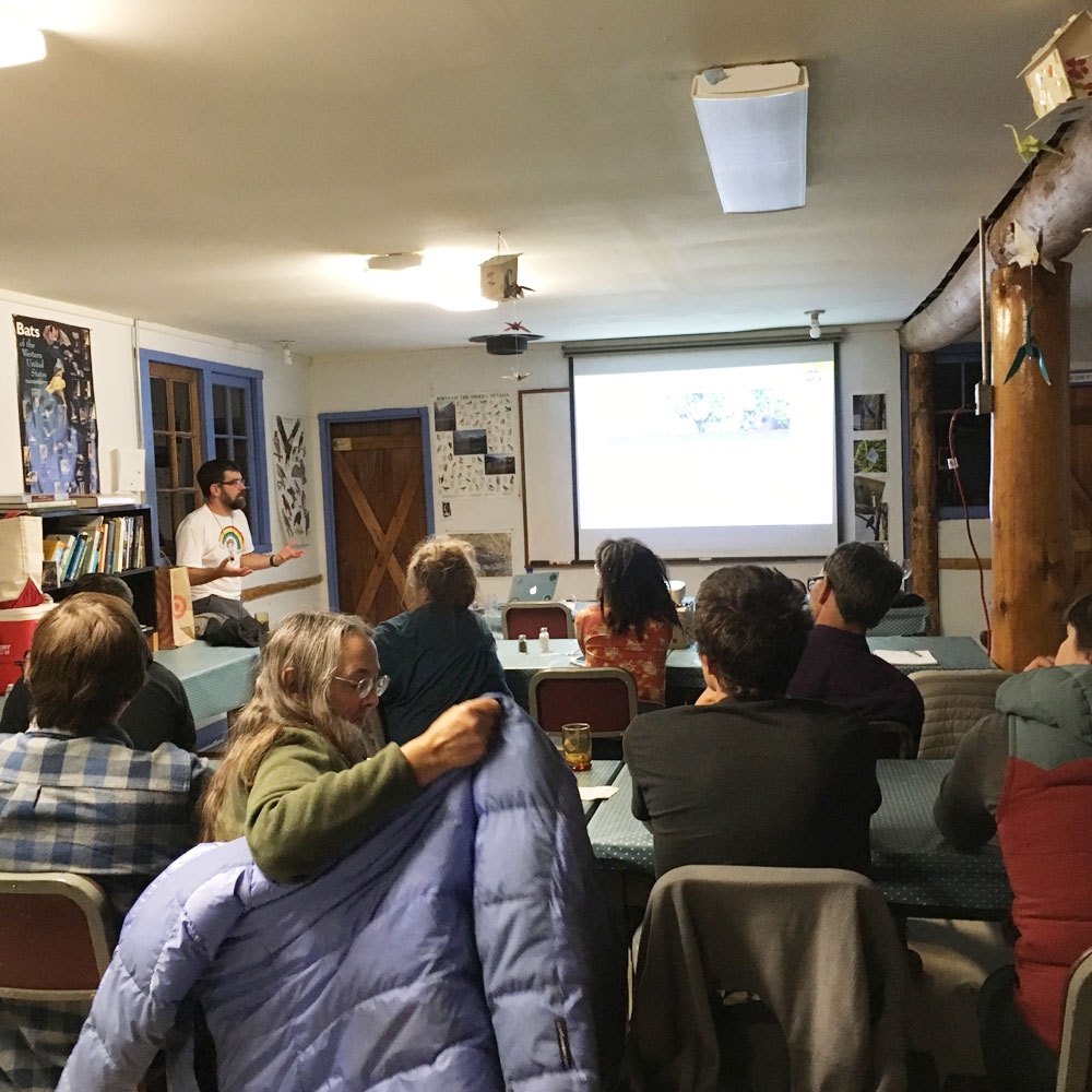the denver botanic gardens team listening to a lecture