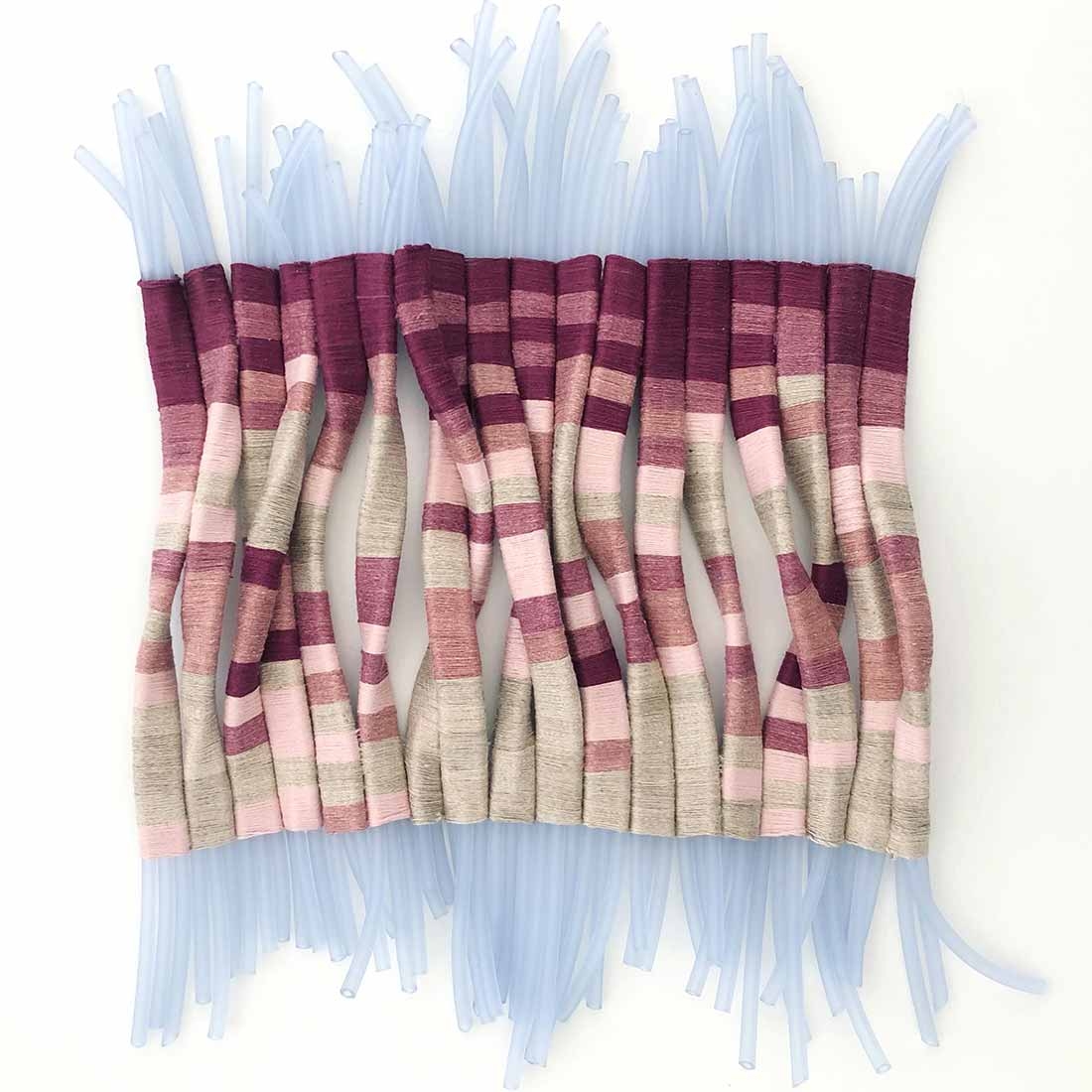 Tali Weinberg, "Drainage Study: Entwined," petrochemical-derived medical tubing, organic cotton, plant and insect dyes, mineral mordants, 2021. Tali Weinberg, "Drainage Study: Entwined," petrochemical-derived medical tubing, organic cotton, plant and insect dyes, mineral mordants, 2021.