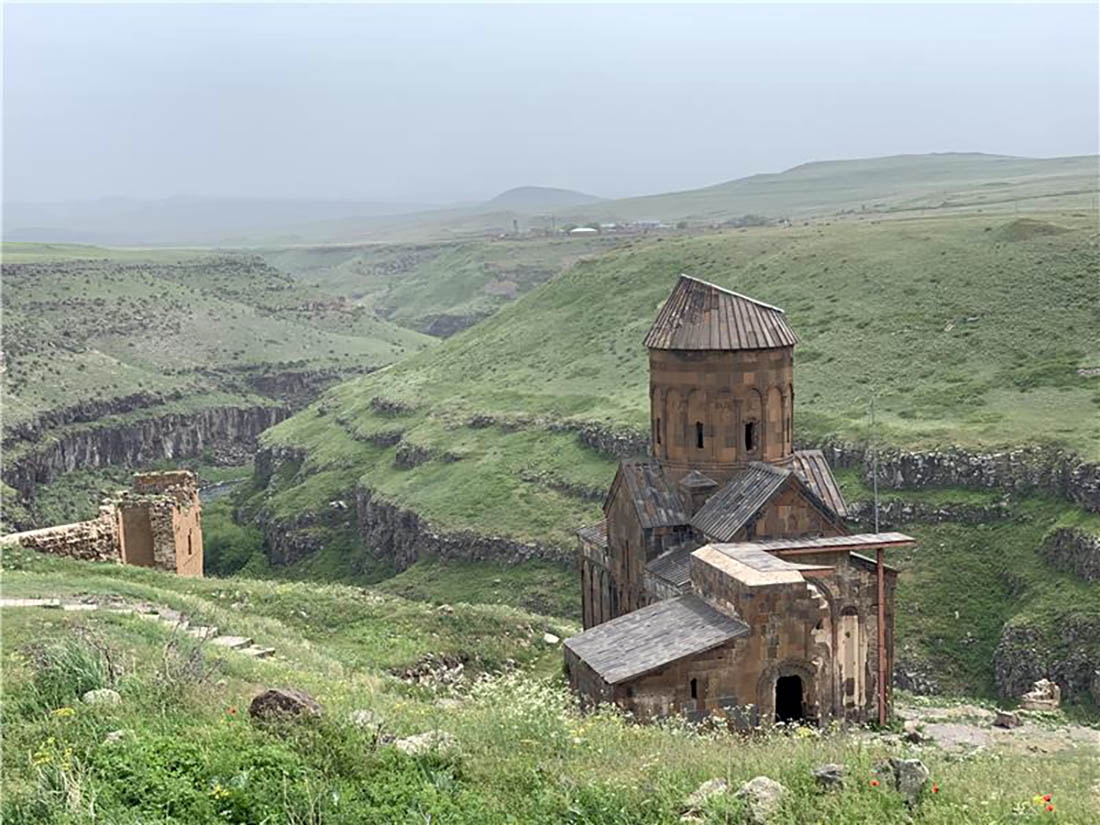 Ancient stone buildings on mountainous landscape