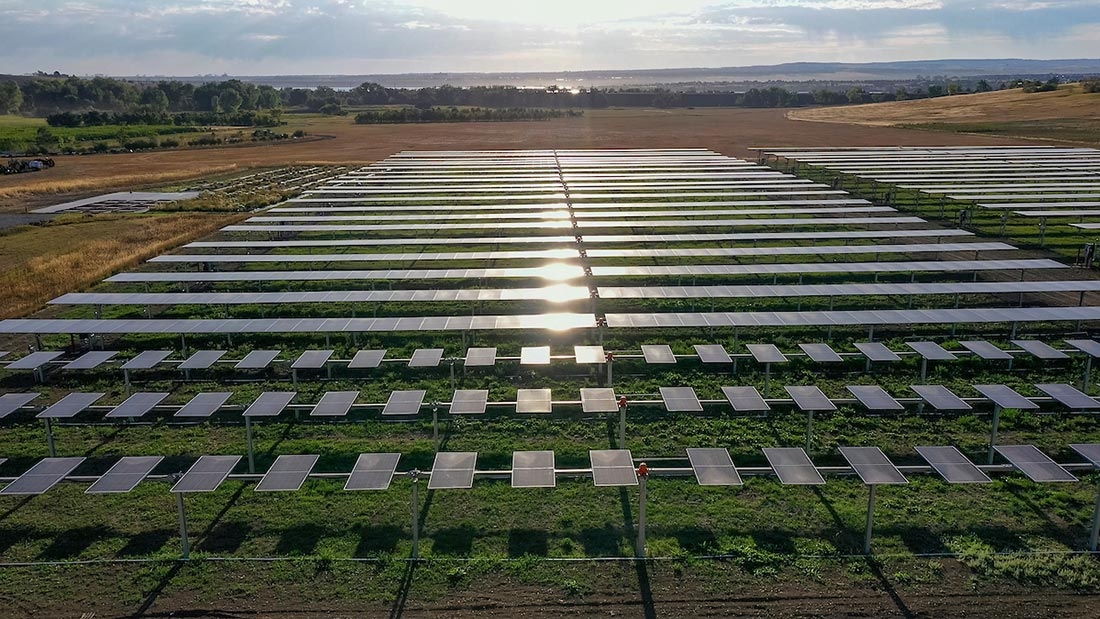 Solar panels at Chatfield Farms at dusk.