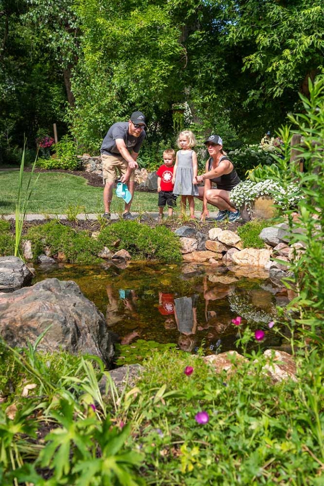 Toddler and Preschool Programs gallery Adult and children pointing at water in a river