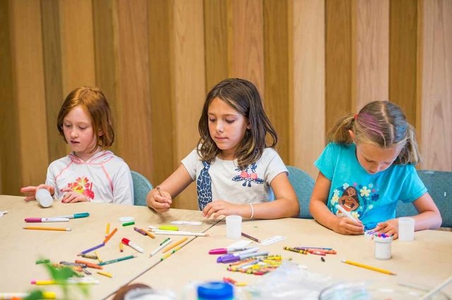 York Street Three girls doing crafts for Scout and community group programs