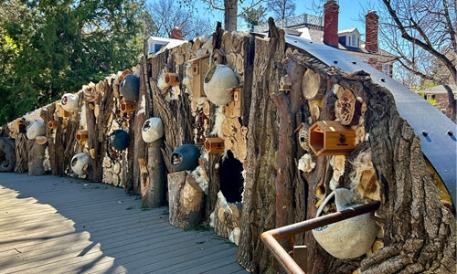 Curved wall with pollinator habitats