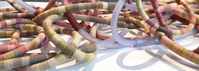Tali Weinberg, "Bound," petrochemical-derived medical tubing, plant fibers, plant and insect dyes, 2024. Tali Weinberg, "Bound," petrochemical-derived medical tubing, plant fibers, plant and insect dyes, 2024.
