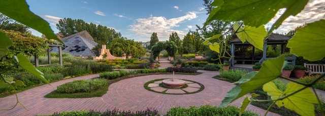 Circular brick pathway with greenery all around
